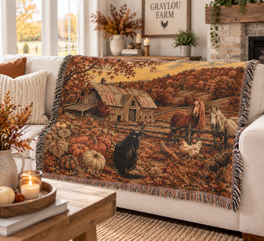 Autumn at GrayLou Farm woven blanket styled on a light farmhouse sofa
